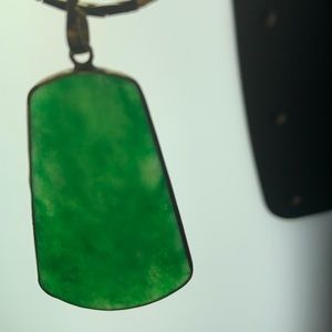 Green jade pendant with gold tone necklace 16”